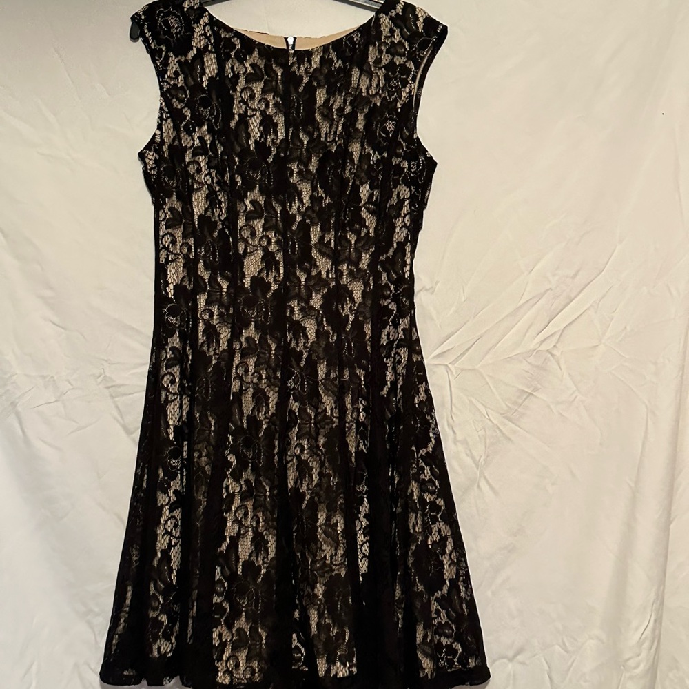 Tan line dress with black lace size 12 color is black and tan worn one time
